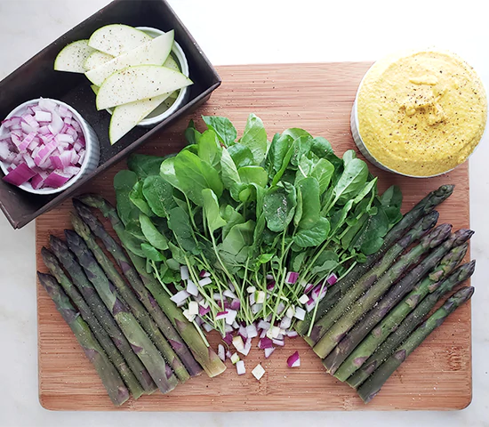 Spread of veggies with a turmeric cashew dipping sauce made with Navitas Organics Turmeric Powder