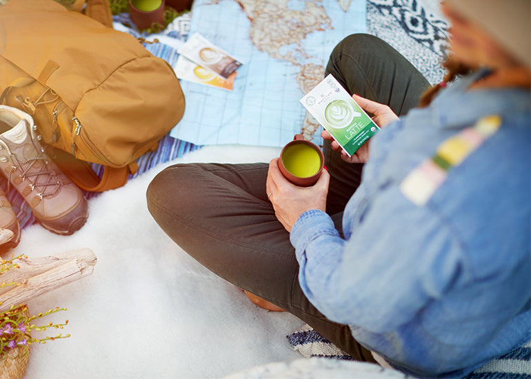 Outdoor campsite with various accoutrements including Navitas Organics Superfood Latte Mixes
