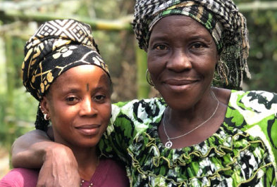 Two farmers standing together